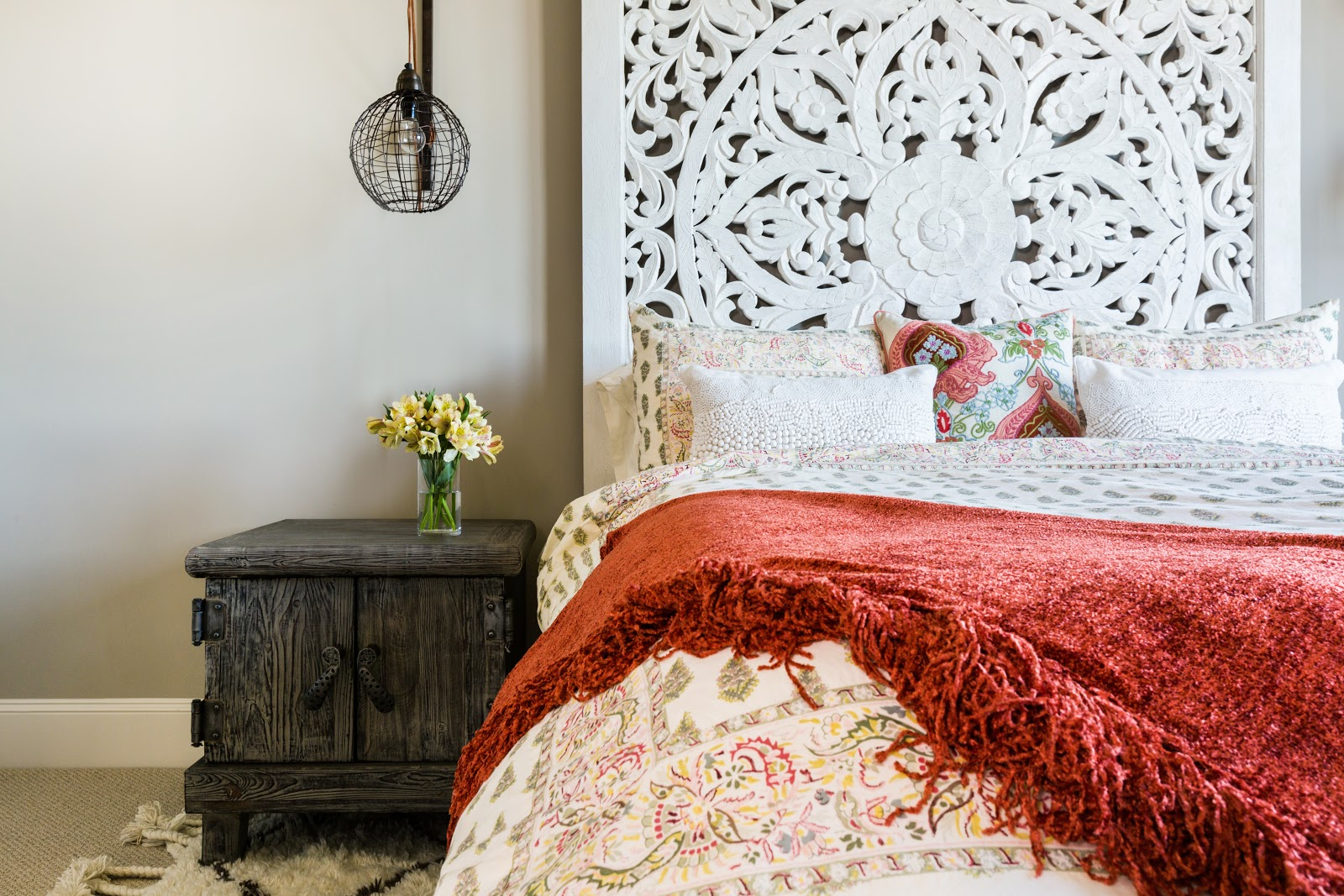 Intricate Anthropologie wooden headboard with India vibe - Laura U Interior Design