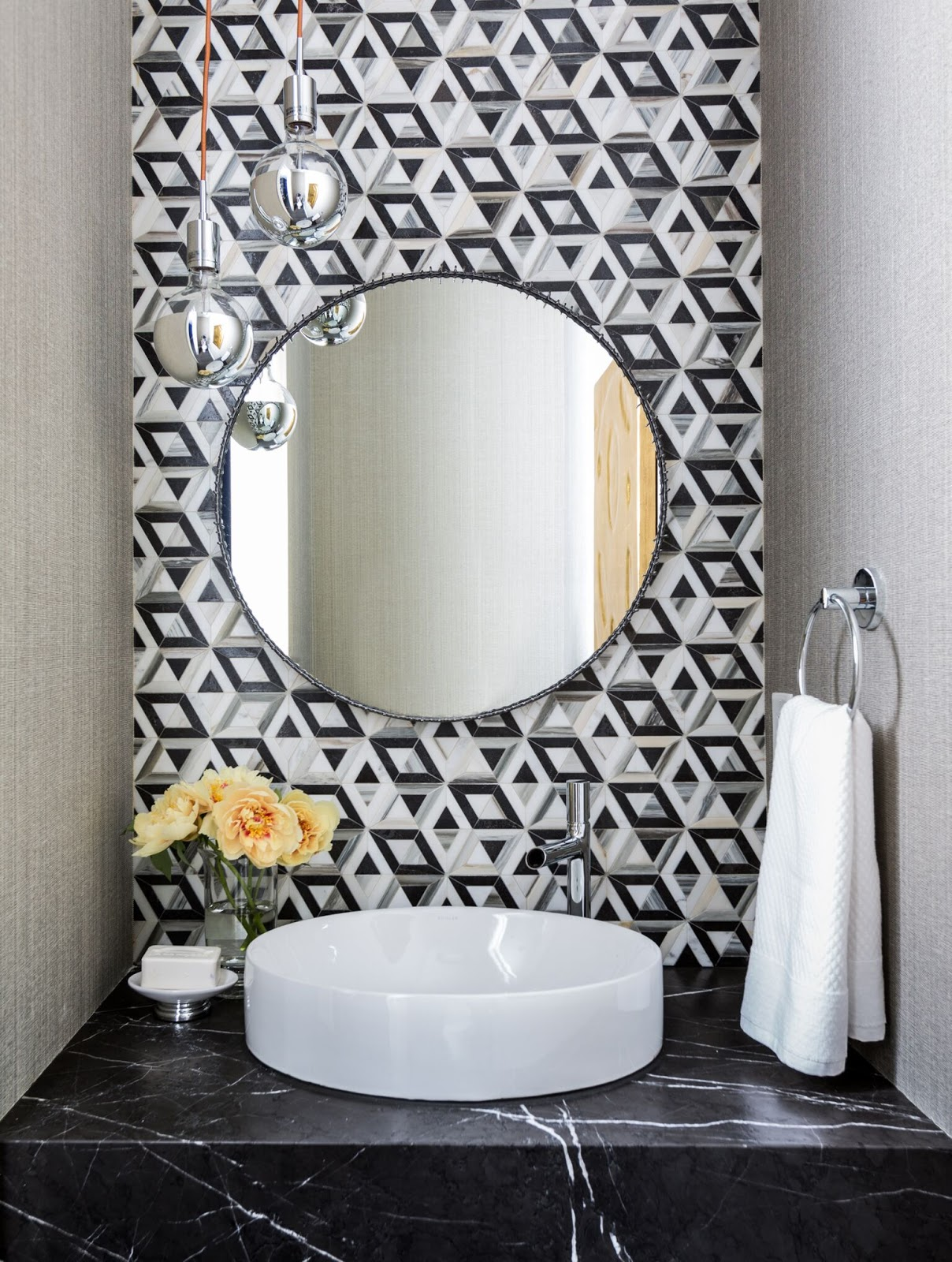 City Living - Ann Sacks geometric tile backsplash in modern powder bathroom - Laura U Interior Design