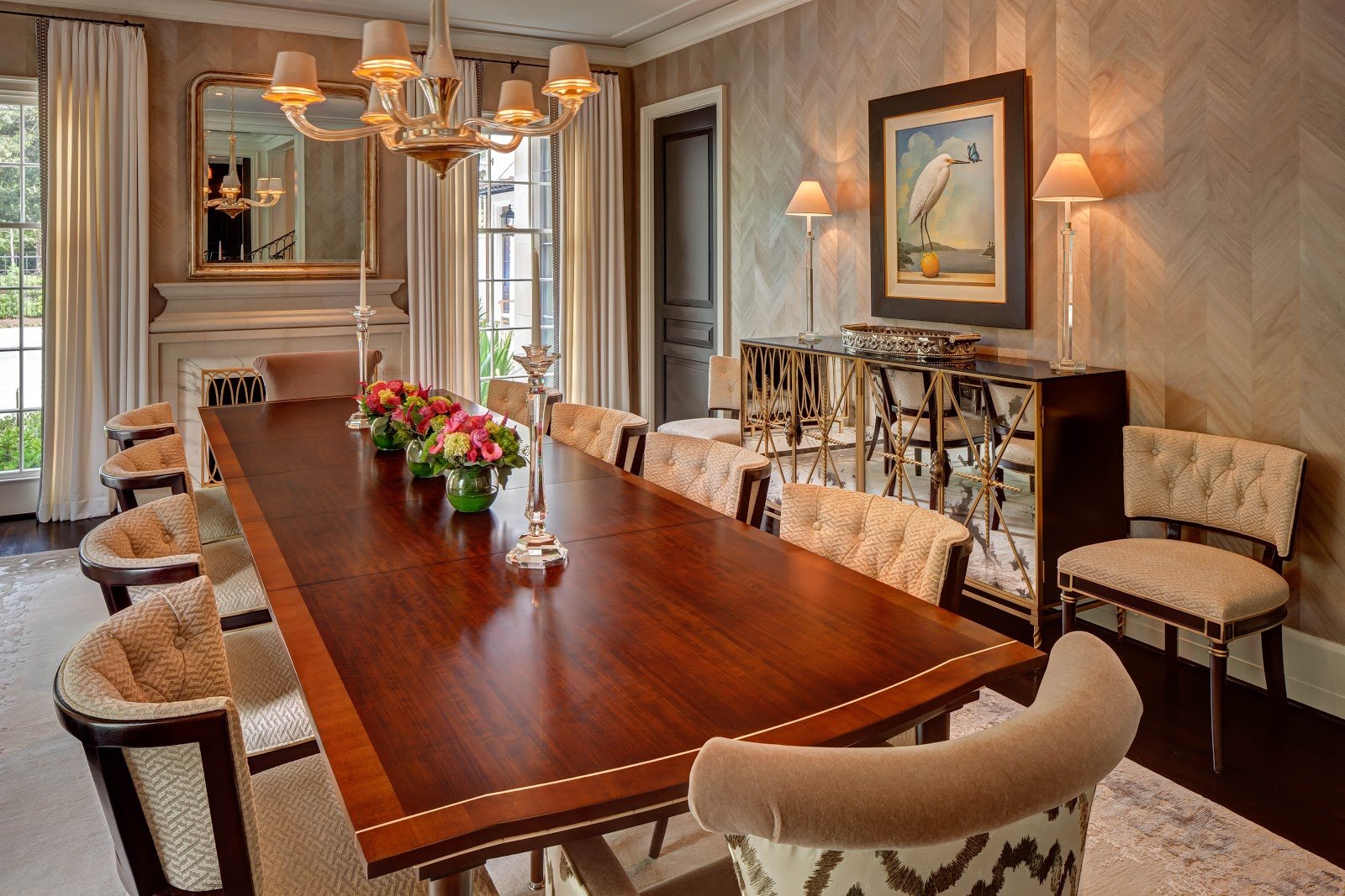 Formal dining room with marble fireplace surround - Laura U Interior Design