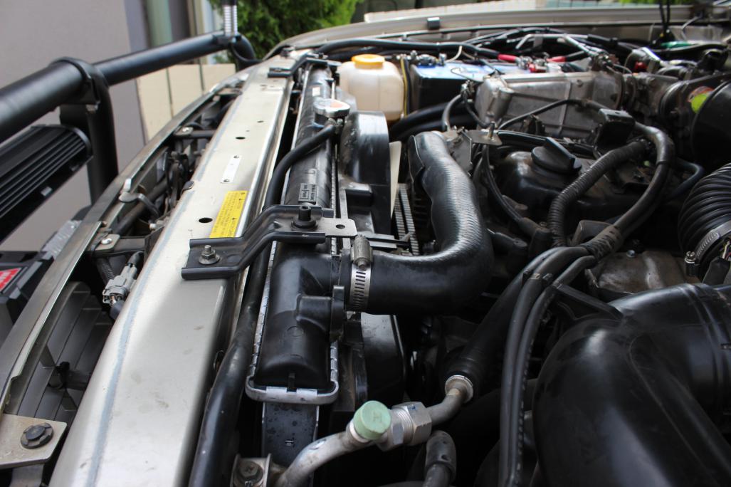 How to replace a headlight bulb on a Nissan Patrol Car Ownership