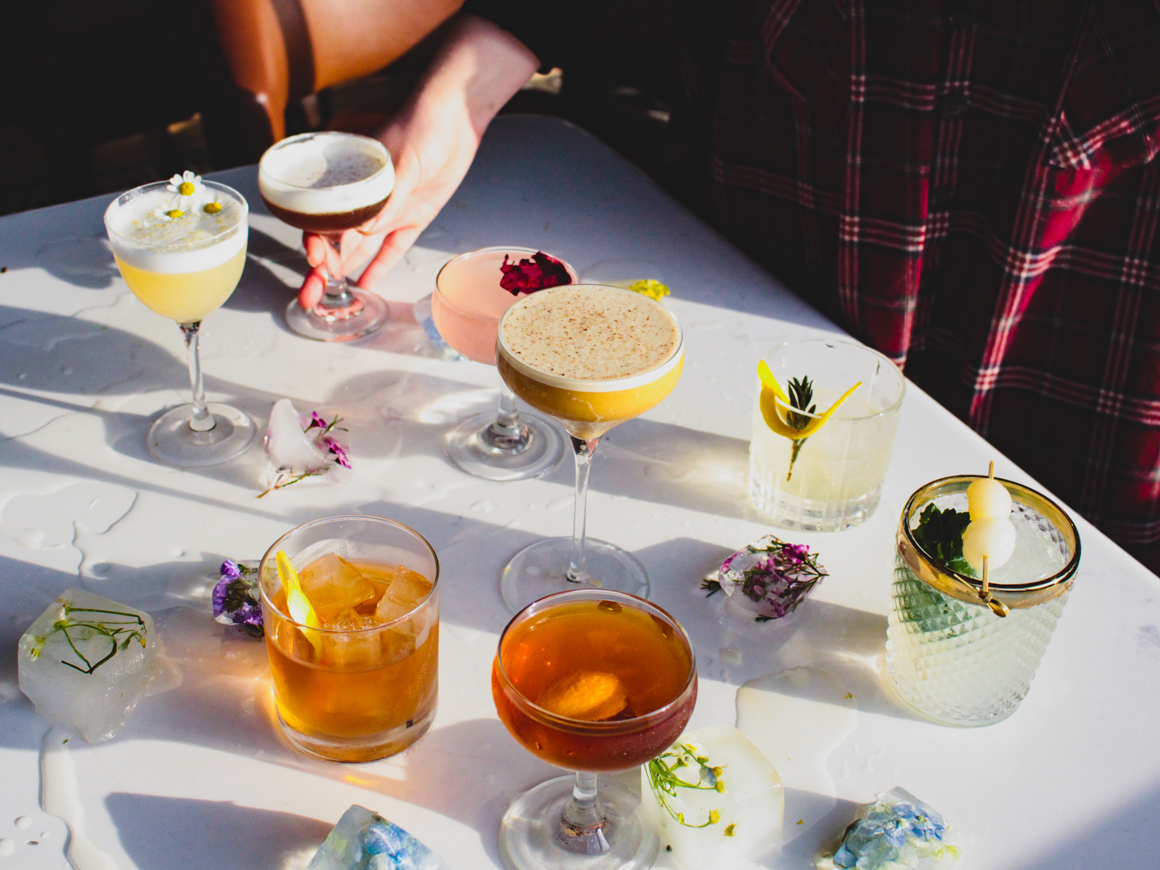 Arrangement of Magnolia House cocktails and mixed drinks