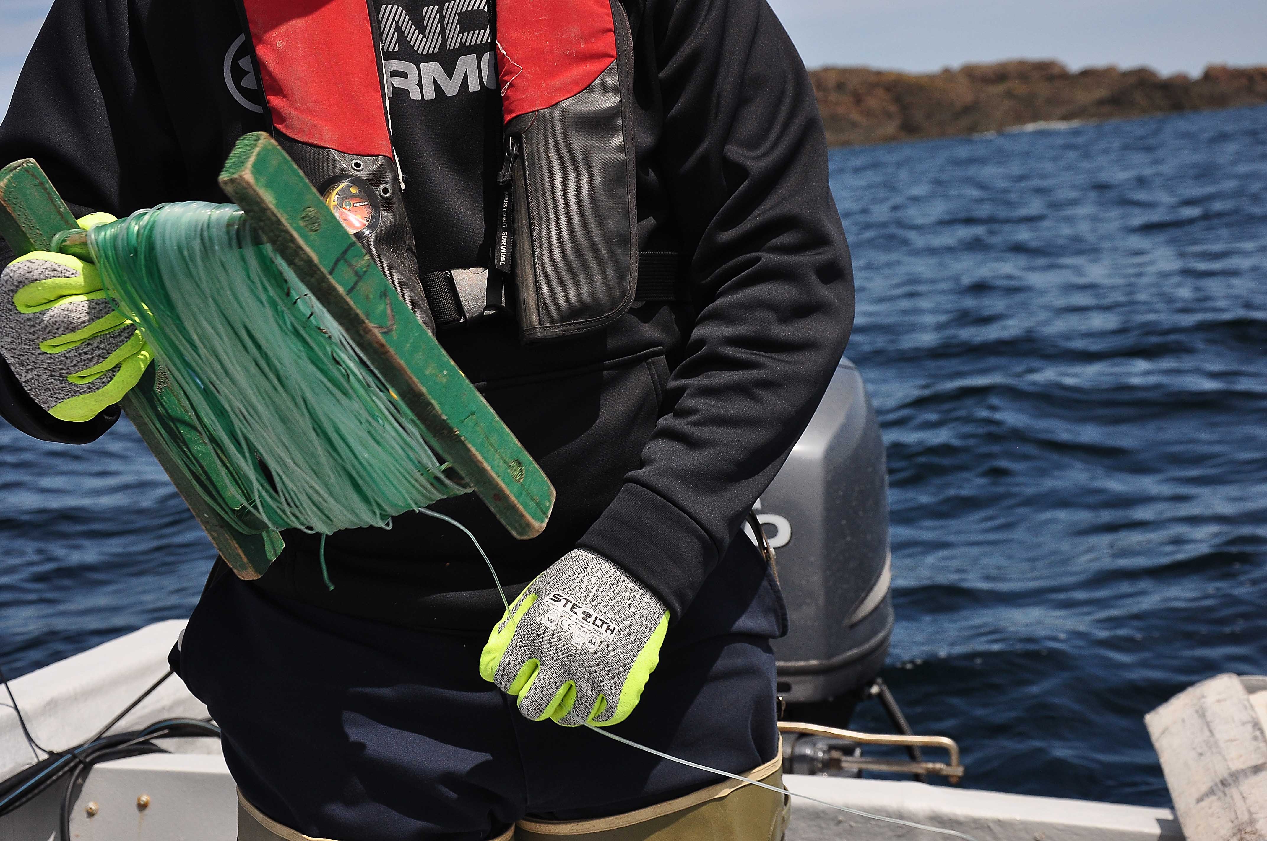 Fisherman wrapping a line